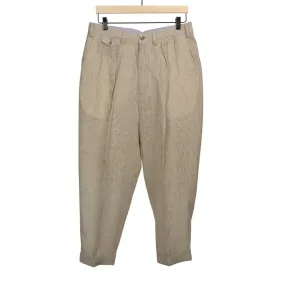 Pleated tapered trousers in ivory houndstooth linen and cupro